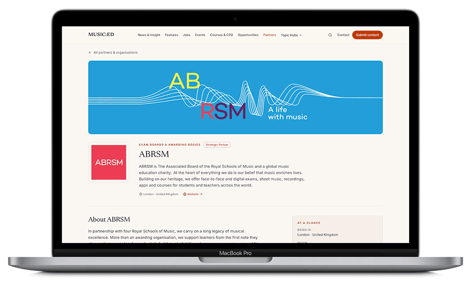 ABRSM organisation LivePage on MUSIC:ED displayed on a laptop, showing the organisation banner, description and at-a-glance details.